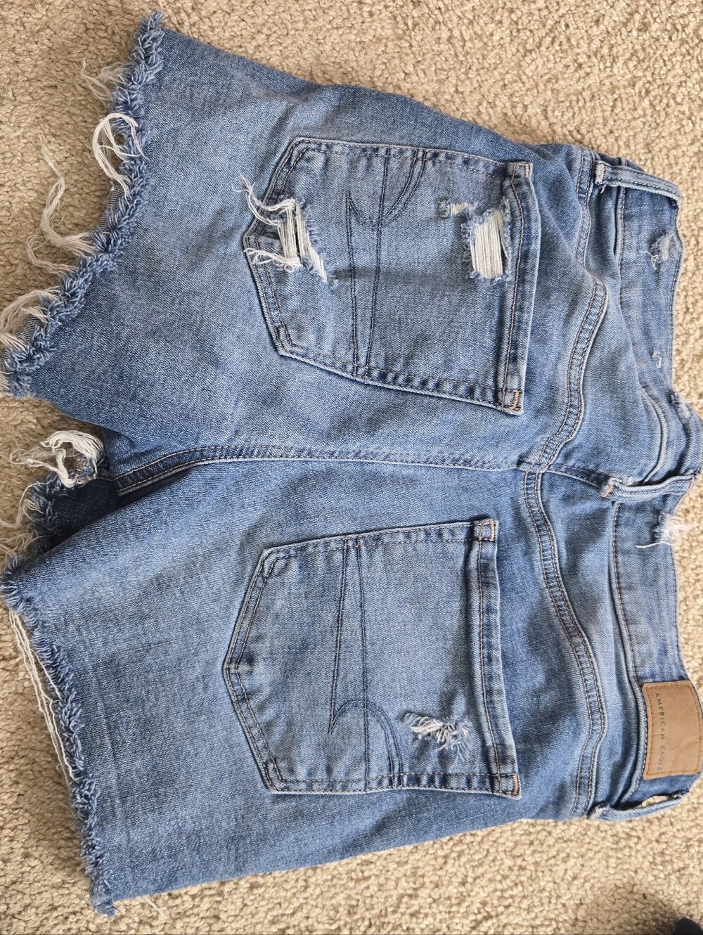 Women’s Light Blue Distressed Denim Shorts